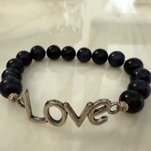 SUPER CUTE, “Love” beaded bracelet! Beads have slight shimmer in them.